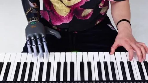 BrainCo helps amputee play piano alongside robot